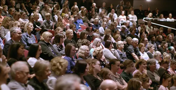 patrons enjoying a seminar